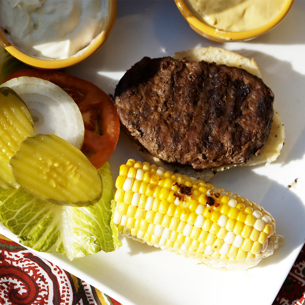 http://www.familypridebison.com/cdn/shop/products/1-3-lb-bison-burger-patty-family-pride_1200x.jpg?v=1670423997